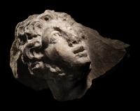 A Roman Marble Head of a Man in Relief