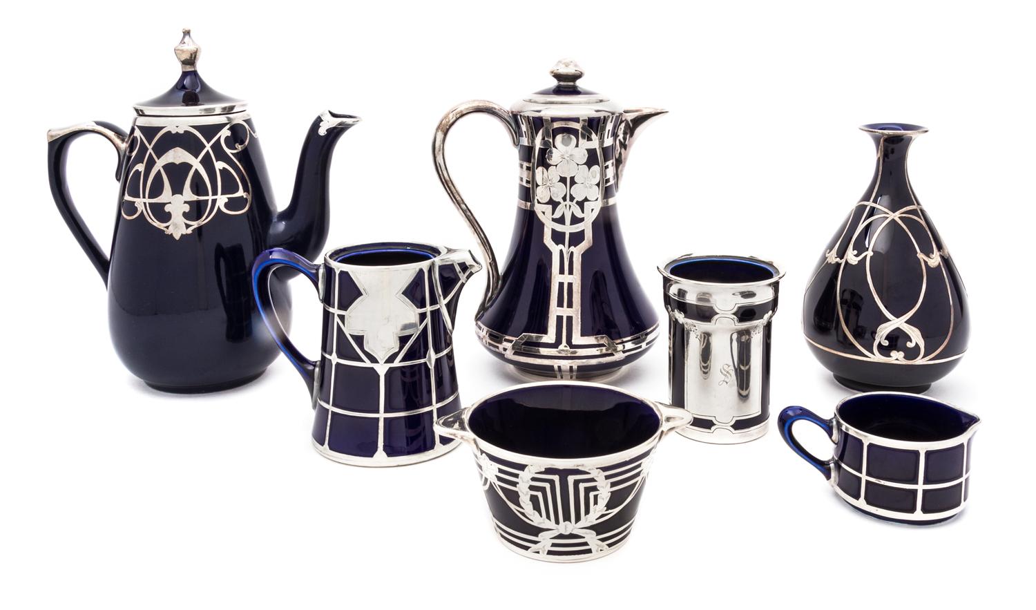 A Group of Seven Silver Overlay Porcelain Table Articles Height of first 8 3/4 inches.