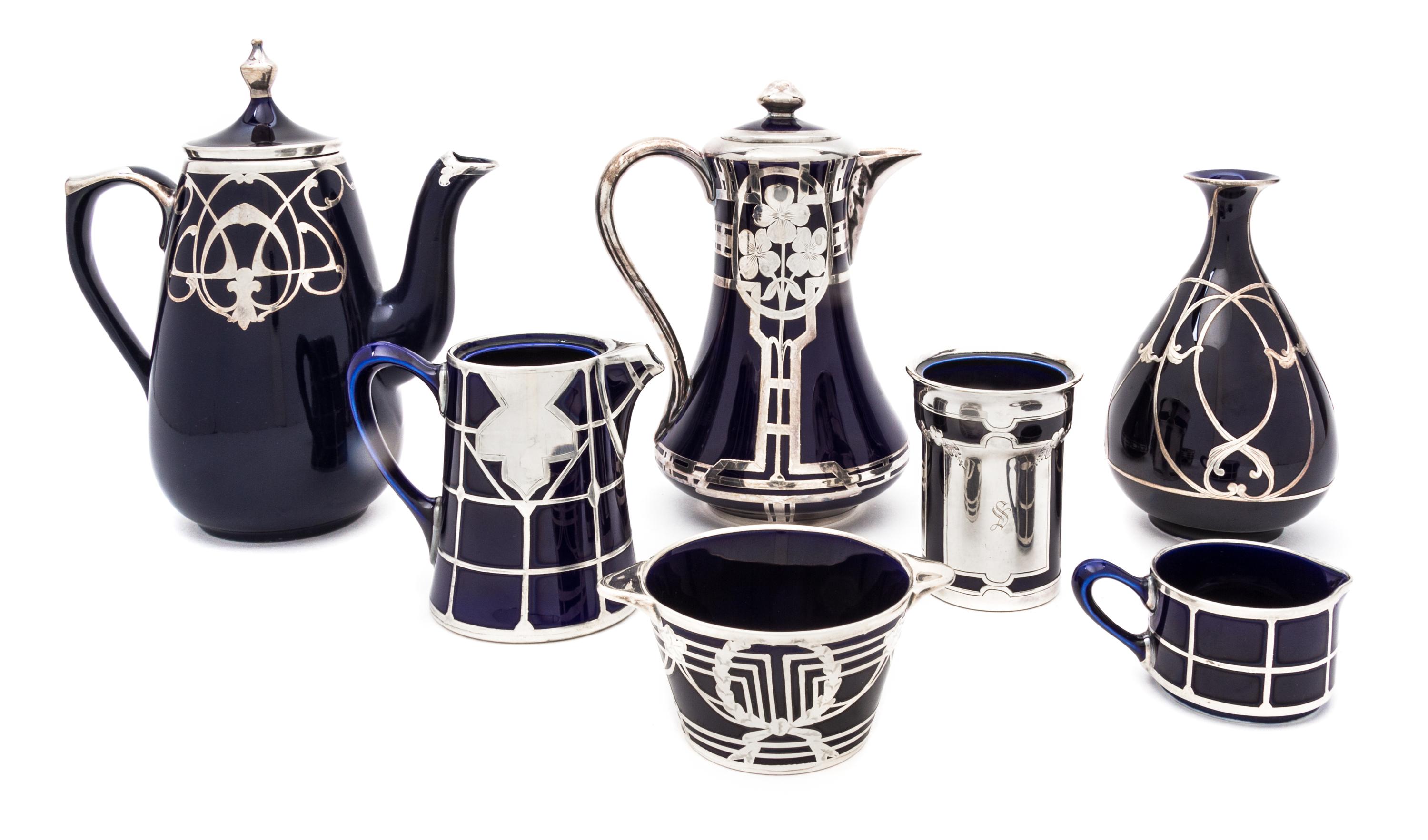 A Group of Seven Silver Overlay Porcelain Table Articles Height of first 8 3/4 inches.