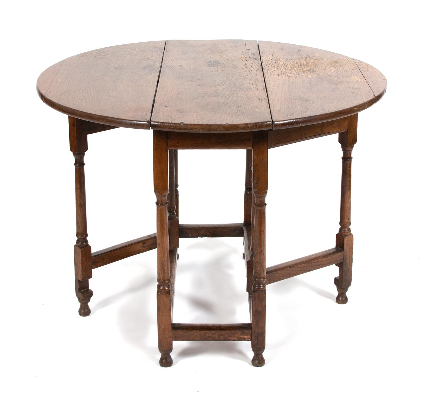 An English Jacobean Style Oak Gate Leg Table Height 27 x width 38 x depth 12 1/2 inches (closed). — 19TH CENTURY
