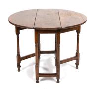 An English Jacobean Style Oak Gate Leg Table Height 27 x width 38 x depth 12 1/2 inches (closed). — 19TH CENTURY