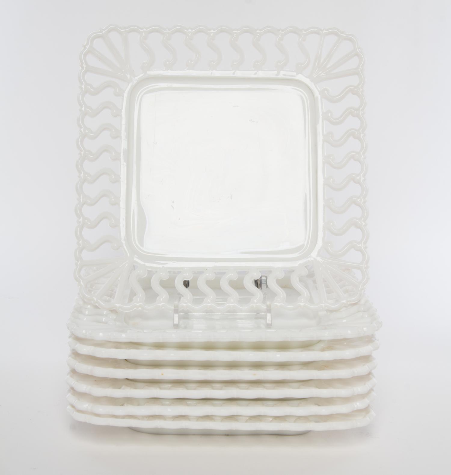 A Group of Milk Glass Plates Diameter 8 1/2 inches.