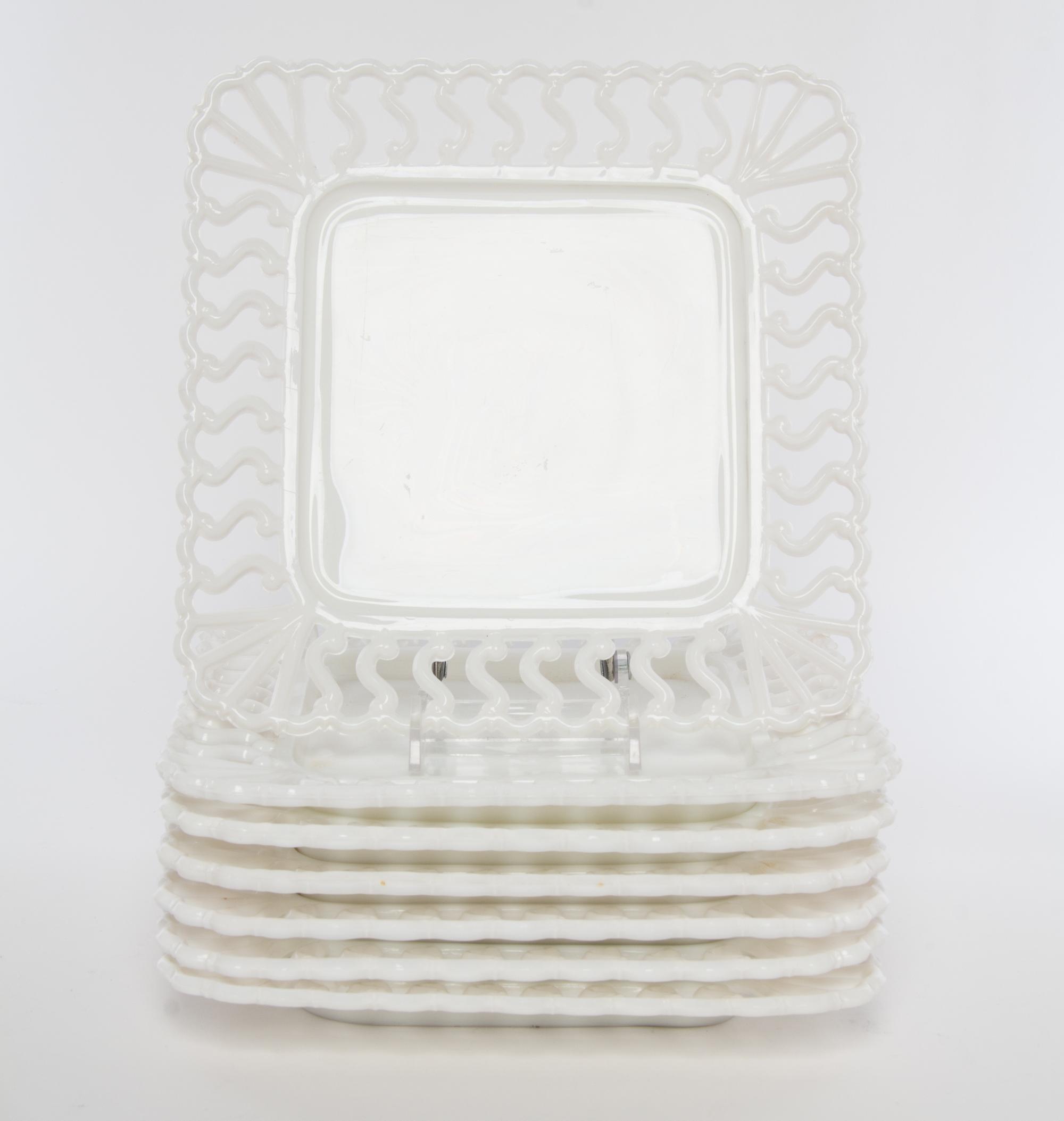 A Group of Milk Glass Plates Diameter 8 1/2 inches.