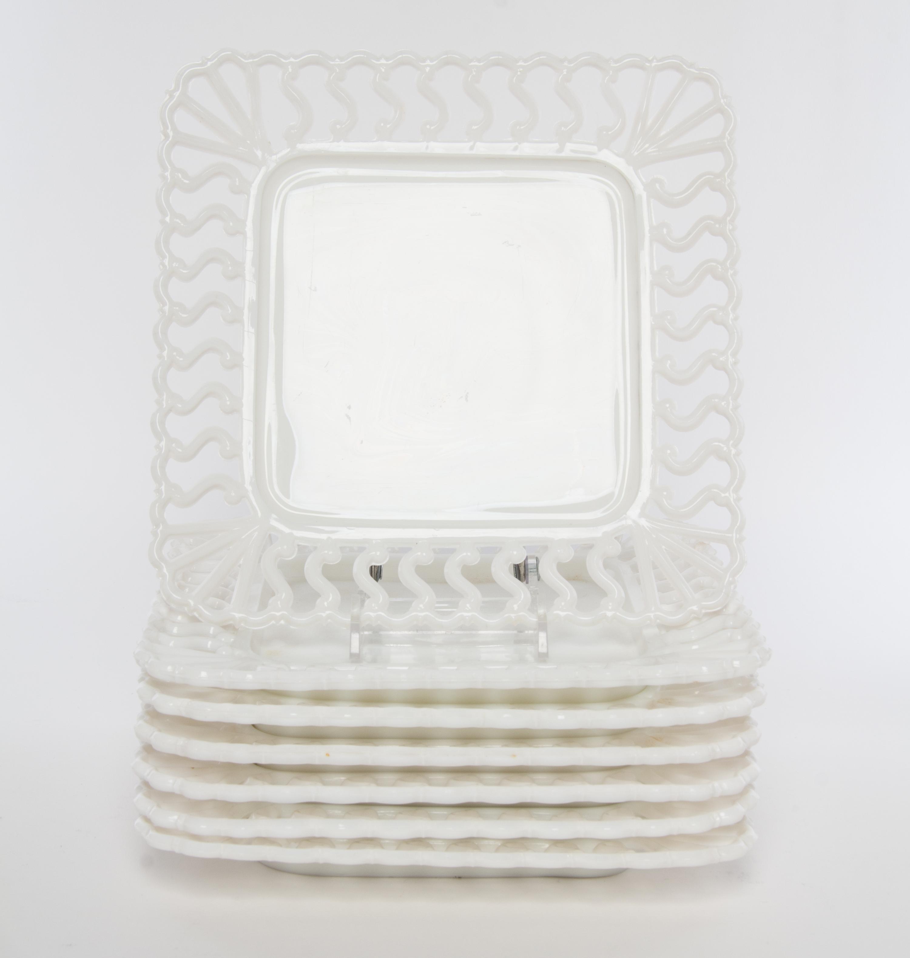 A Group of Milk Glass Plates Diameter 8 1/2 inches.