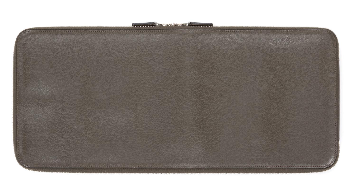An Hermes Olive Togo Leather Tie Case, 18" x 8".