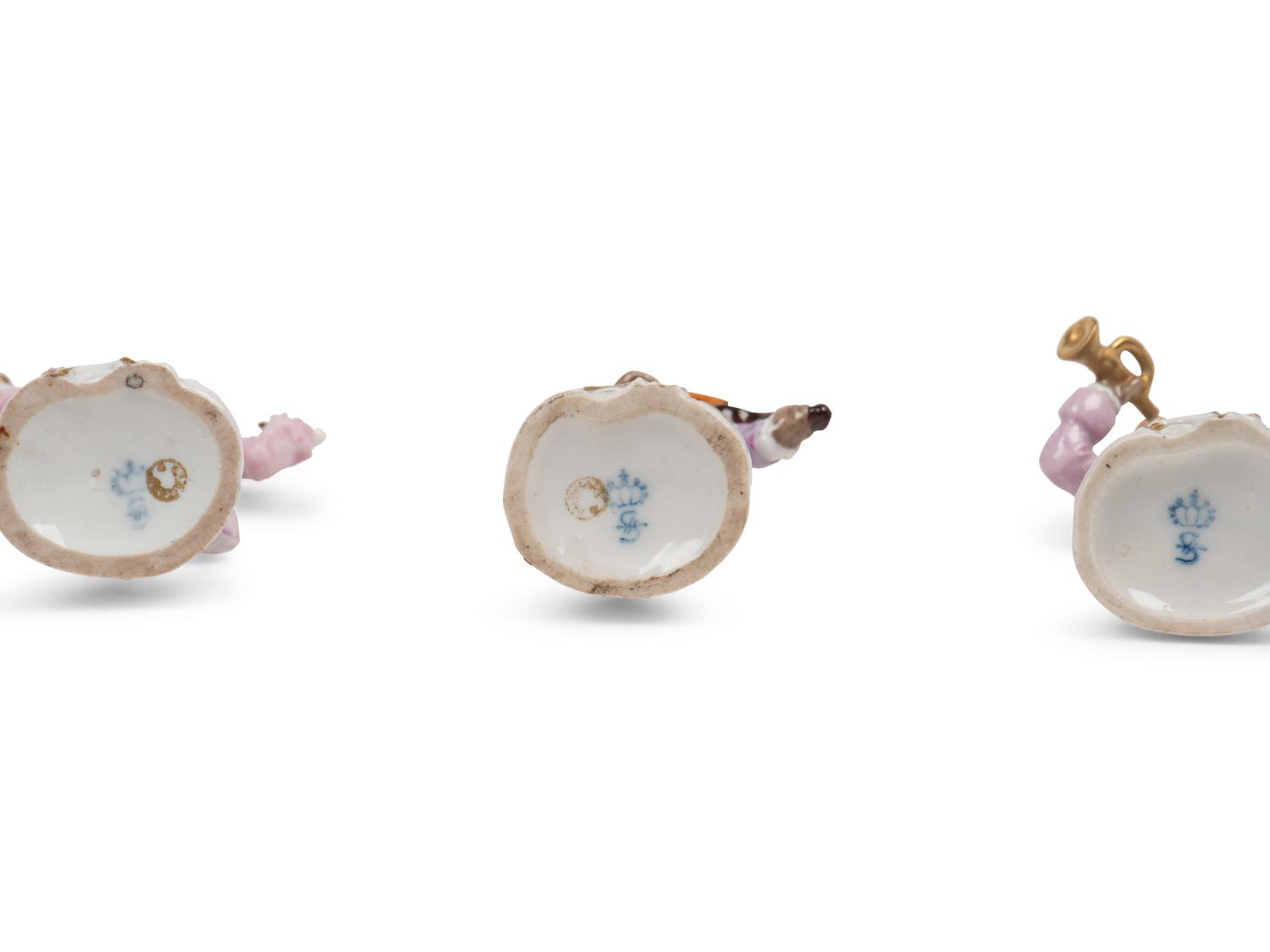A German Porcelain Twelve-Piece Monkey Band