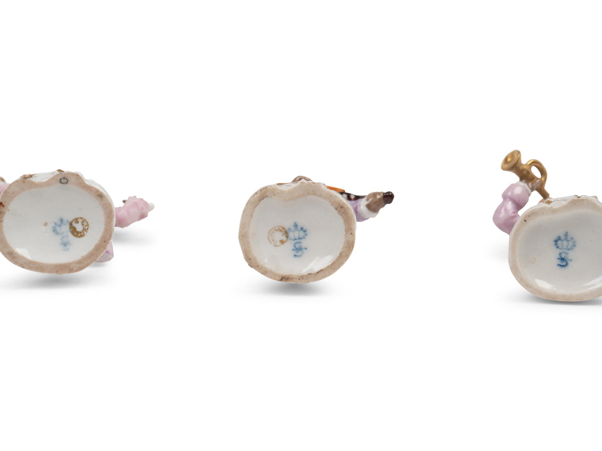 A German Porcelain Twelve-Piece Monkey Band
