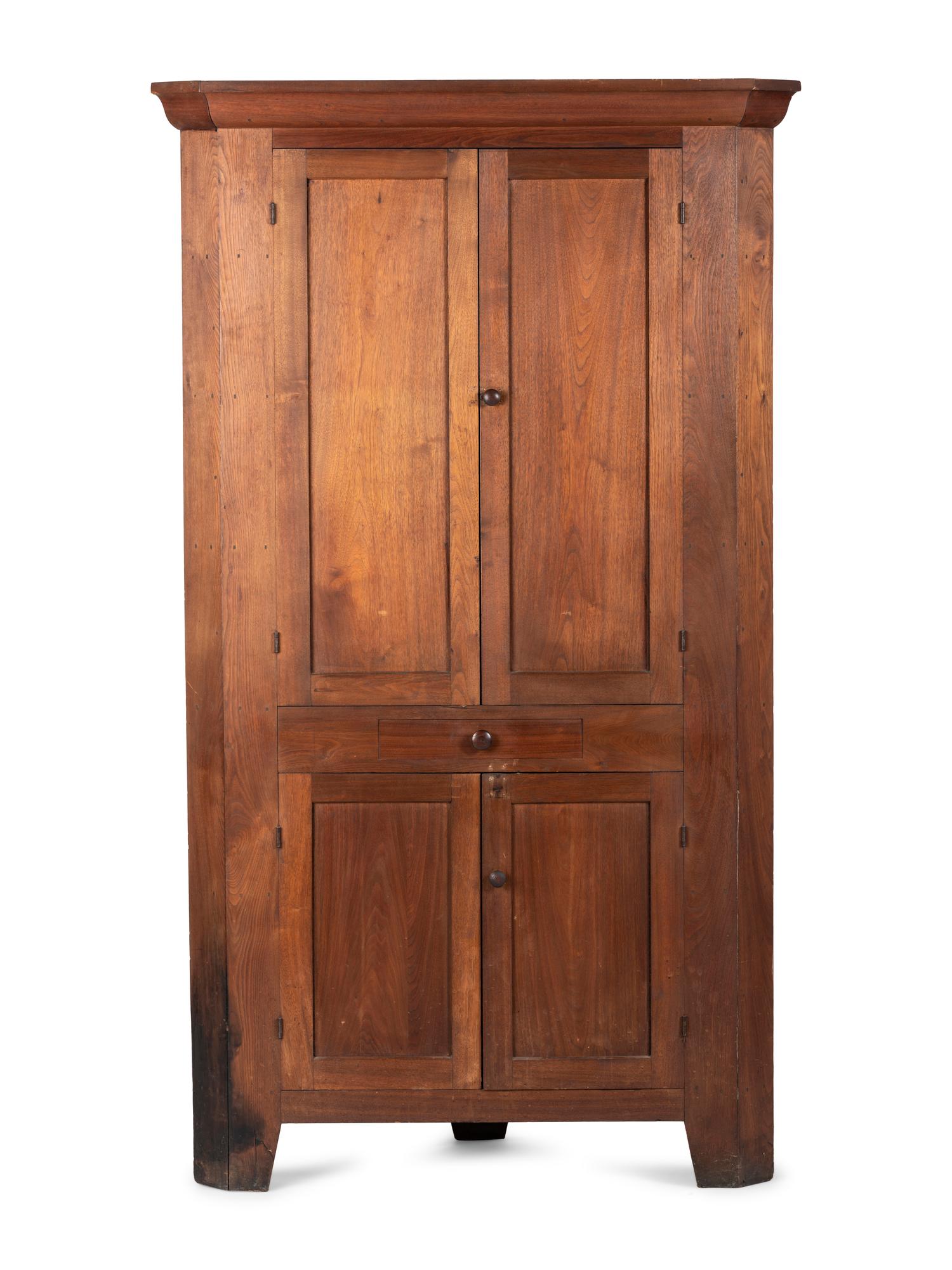 A Late Federal Walnut Corner Cupboard