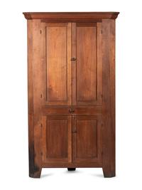 A Late Federal Walnut Corner Cupboard