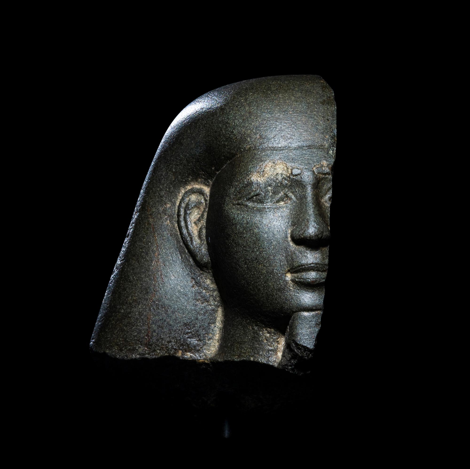 An Egyptian Schist Head of a Male