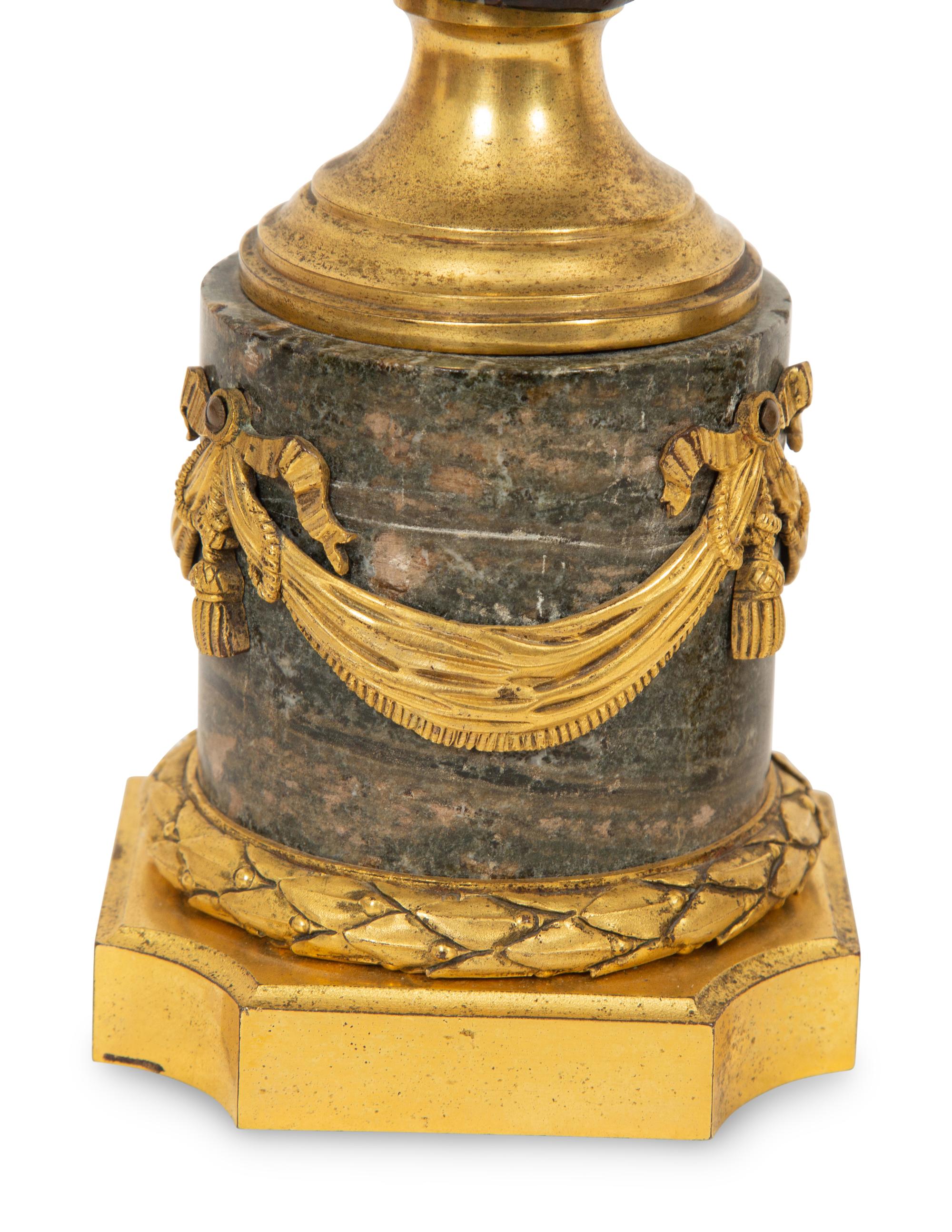A Pair of Russian Carved Marble Busts of Alexander I and Elizabeth Alexeievna on Gilt Bronze-Mounted Marble Pedestals