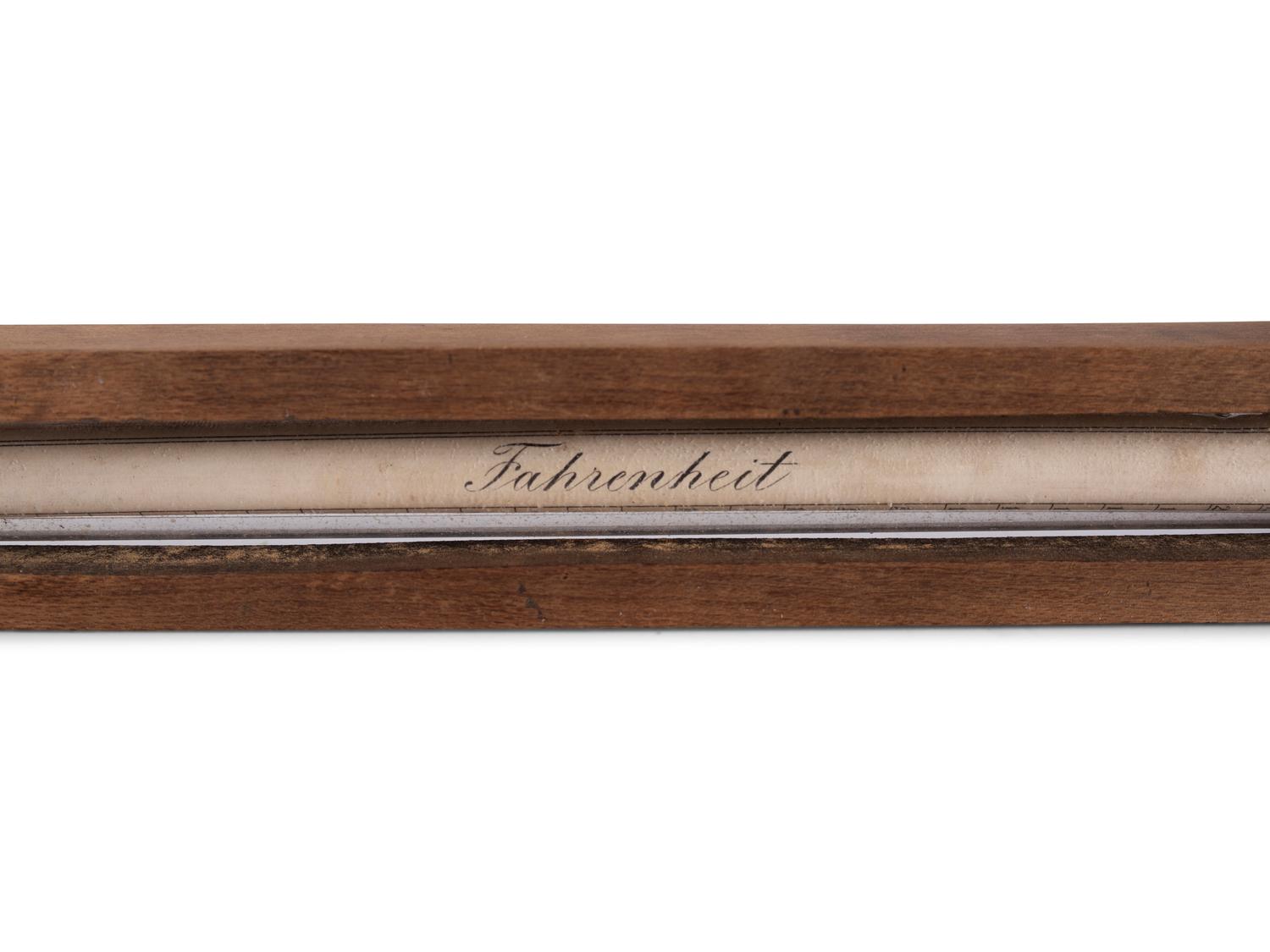 A Copper Tycos Candy Thermometer and a Wood Encased Floating Bath or Dairy Thermometer