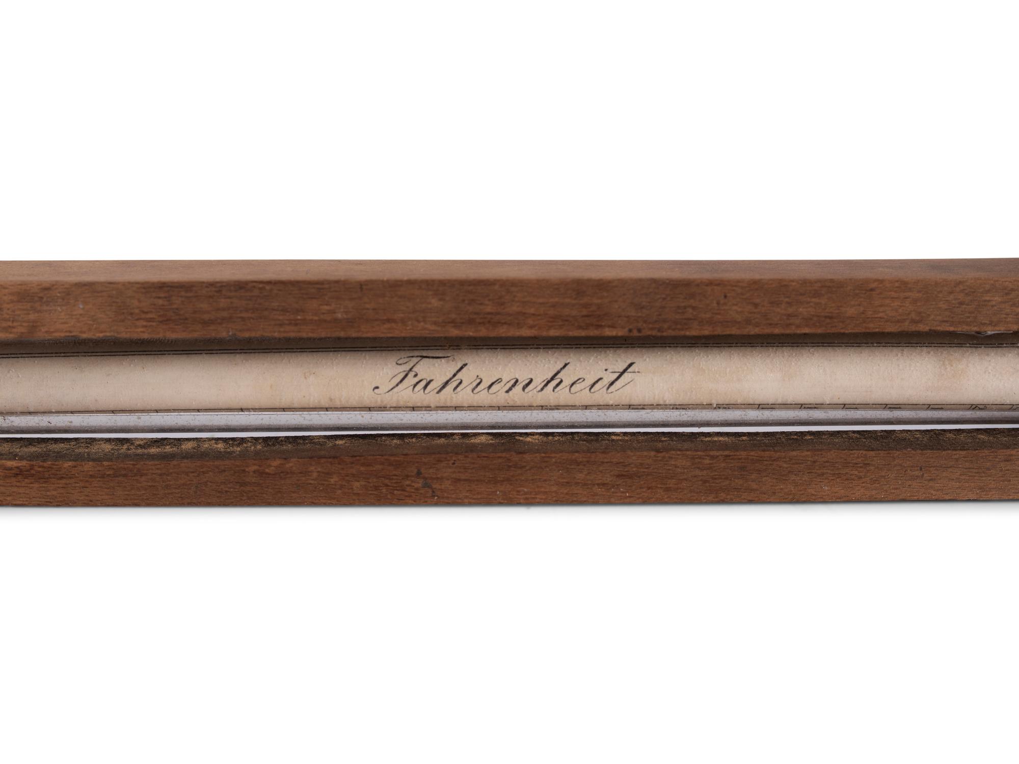 A Copper Tycos Candy Thermometer and a Wood Encased Floating Bath or Dairy Thermometer