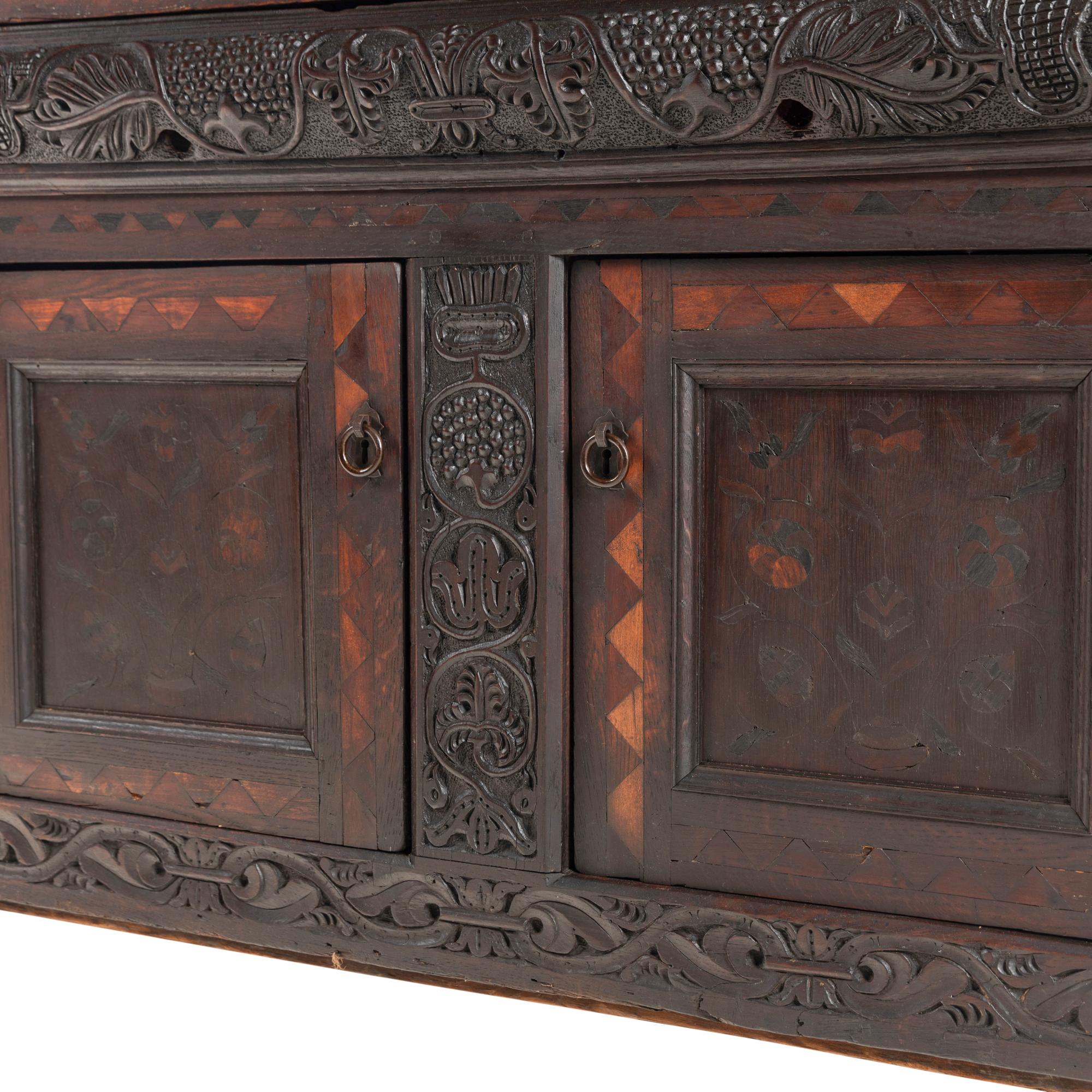 A William and Mary Carved Oak and Marquetry Court Cupboard