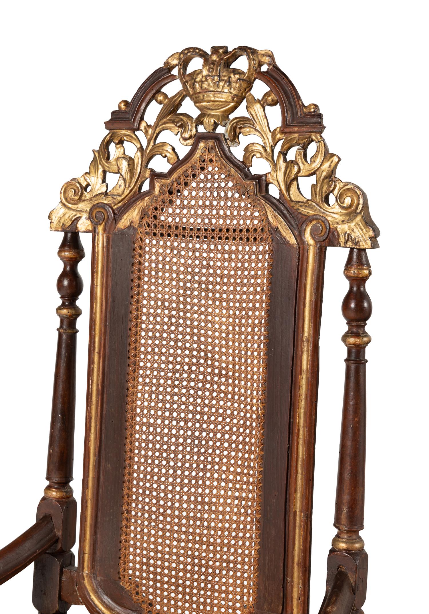 A Pair of William and Mary Style Parcel Gilt Caned and Pierced-Carved Beechwood Armchairs