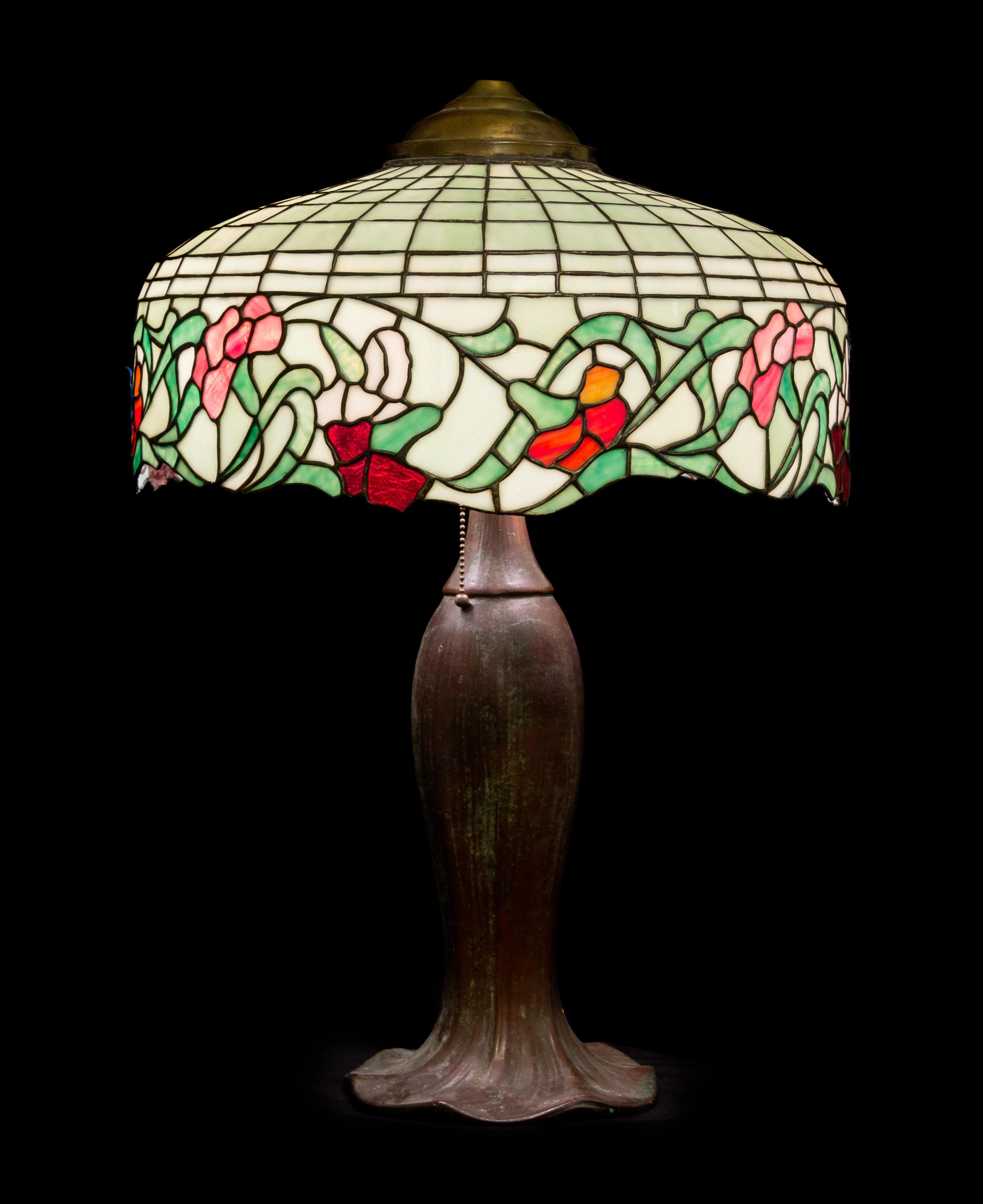 American, EARLY 20TH CENTURY, a leaded glass table lamp