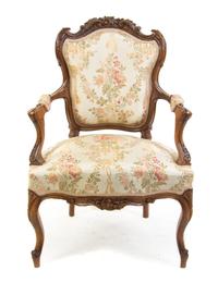 A Victorian Walnut Fauteuil Height 36 inches. — LATE 19TH CENTURY