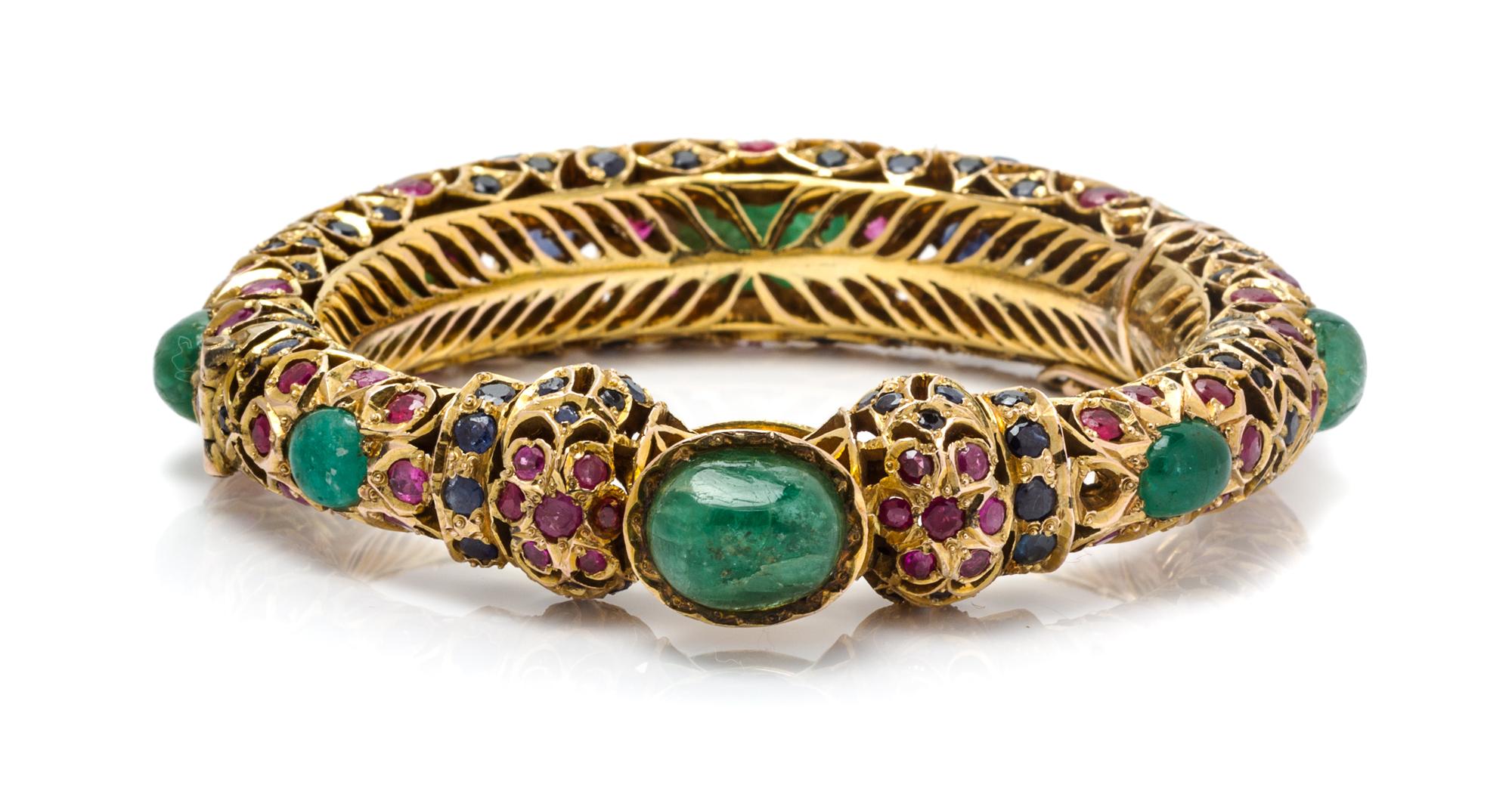 A Multigem Bangle Bracelet, 53.20 dwts.