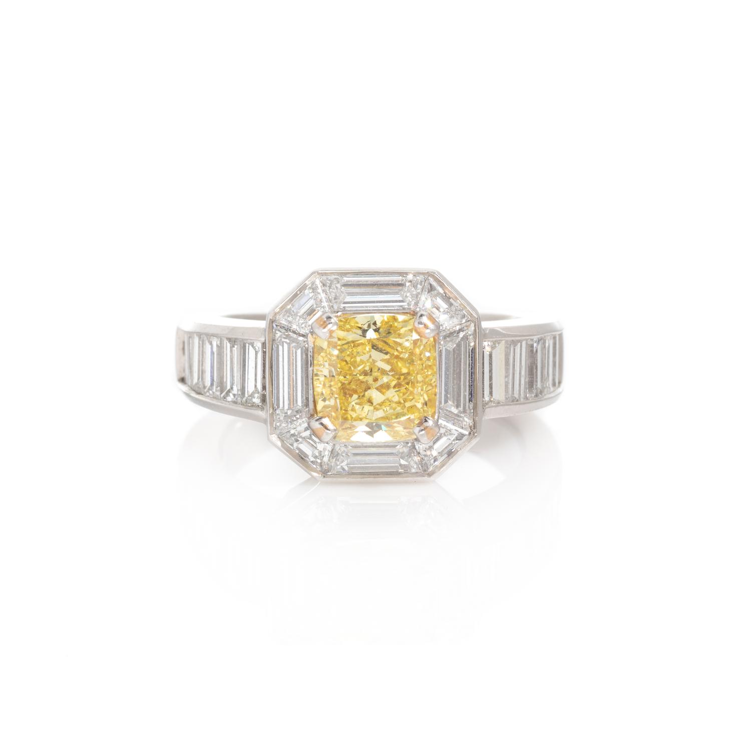 FANCY INTENSE YELLOW DIAMOND AND DIAMOND RING