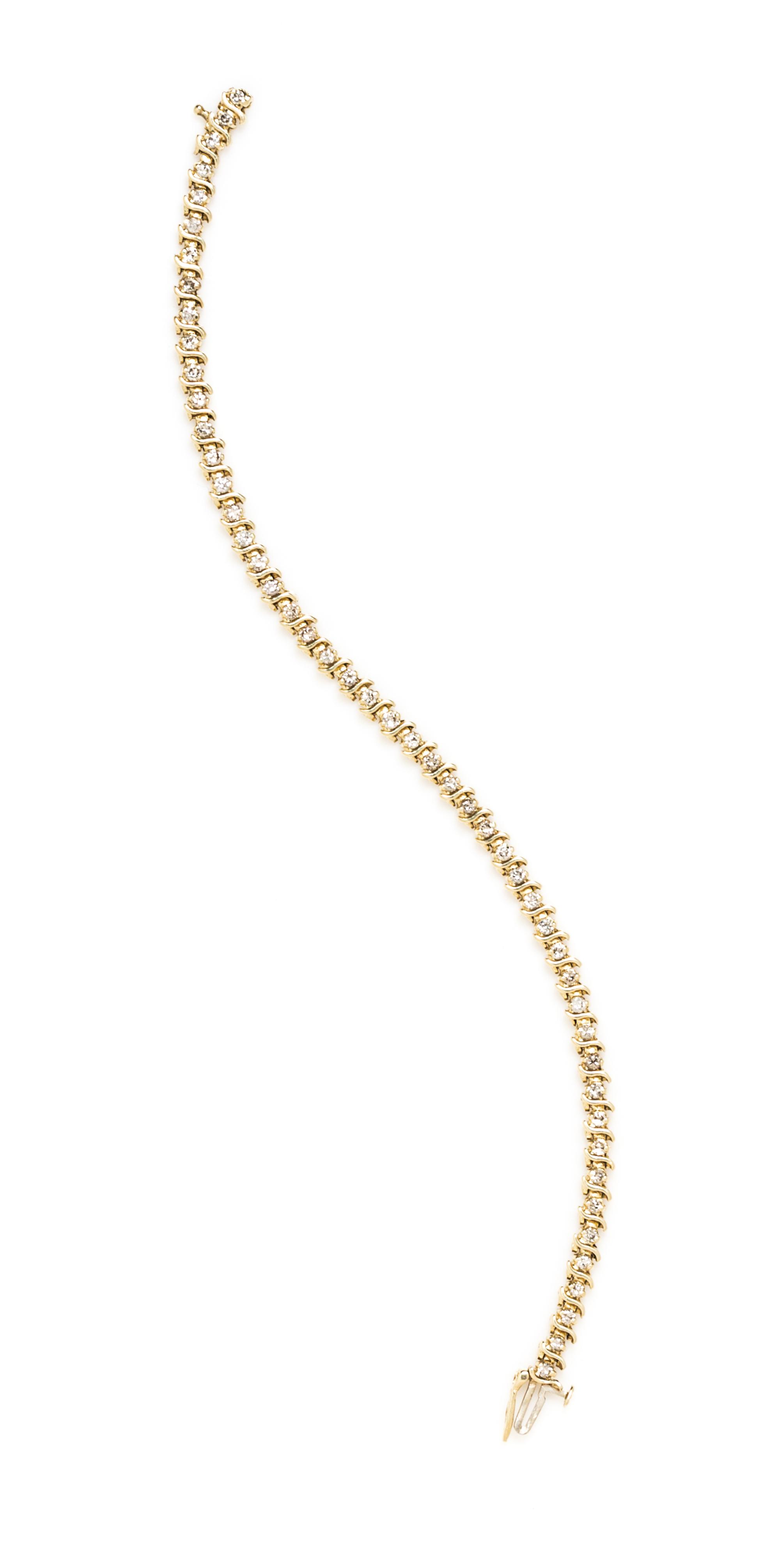 A 14 Karat Yellow Gold and Diamond Line Bracelet, 6.60 dwts.