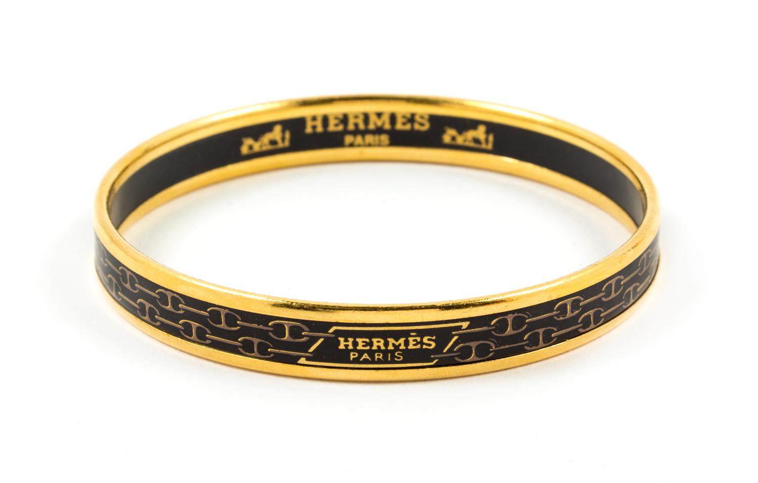 An Hermès Black Enamel Narrow Bangle, 2.5" diameter.