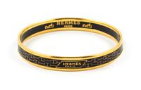 An Hermès Black Enamel Narrow Bangle, 2.5" diameter.