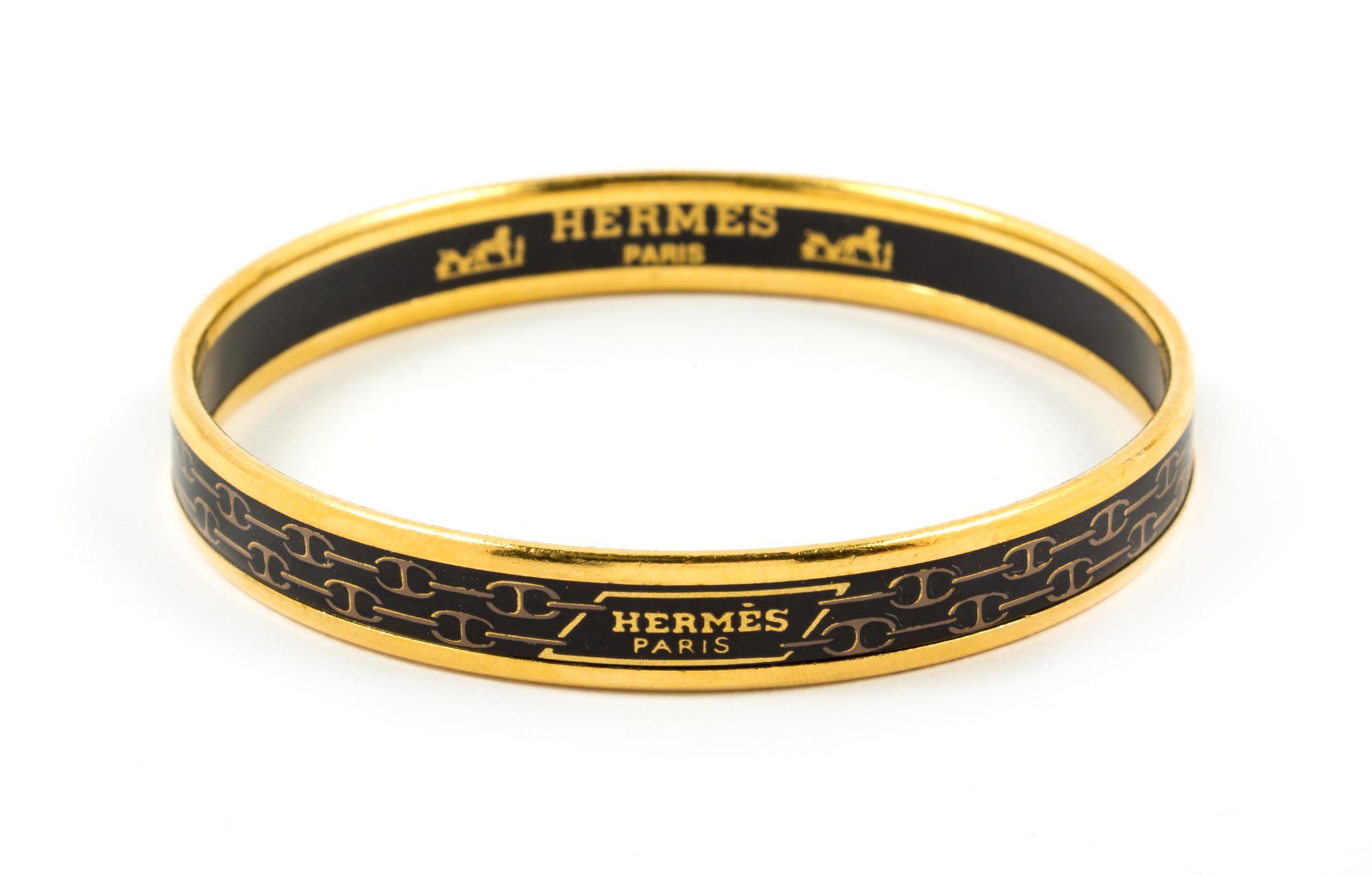An Hermès Black Enamel Narrow Bangle, 2.5" diameter.