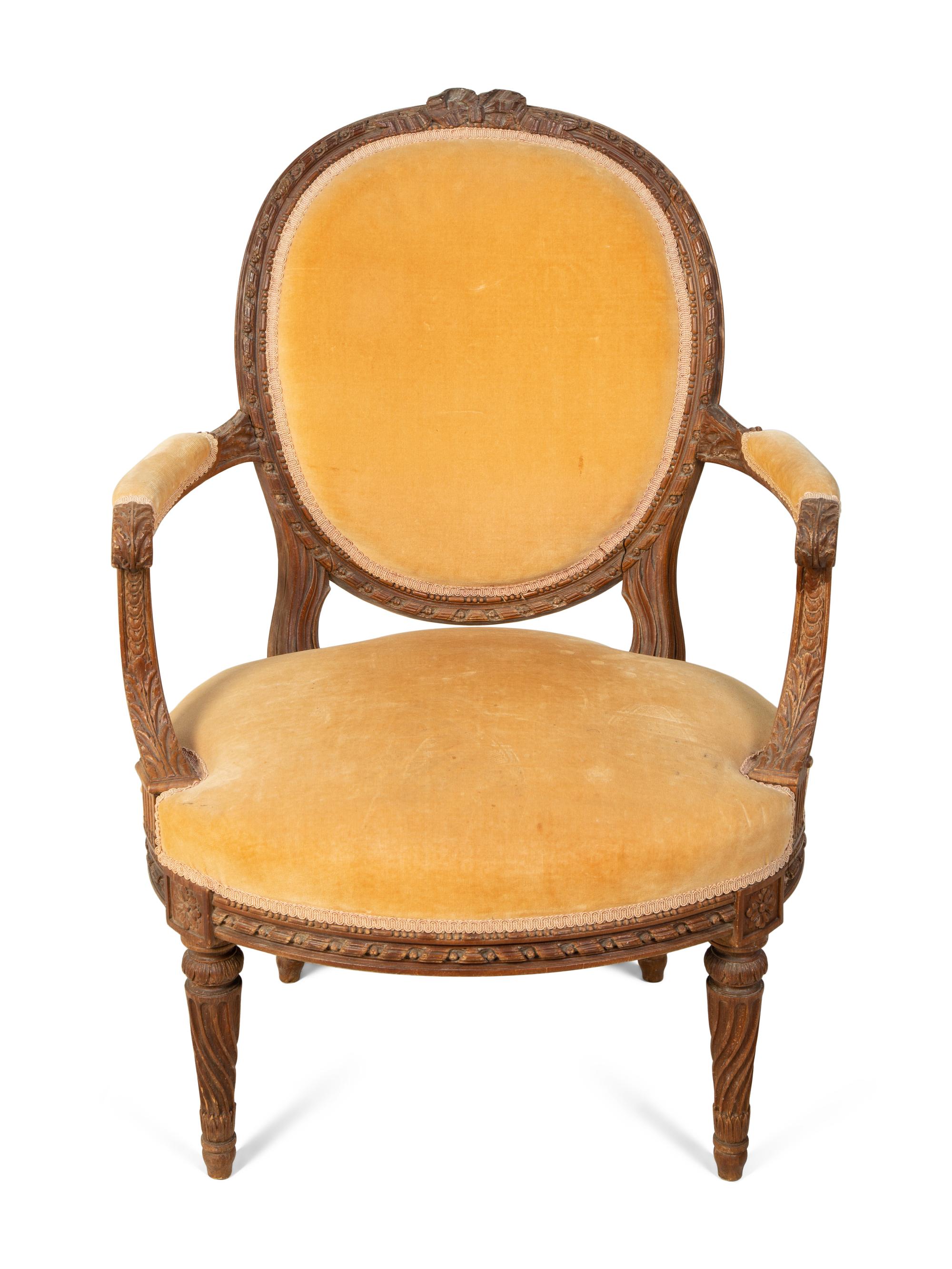 A Louis XVI Style Carved Fruitwood Fauteuil — EARLY 19TH CENTURY