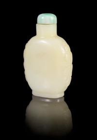 A Glass Imitating Jade Snuff Bottle Height 2 3/4 inches.