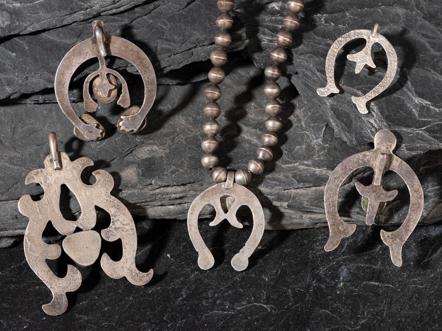 Navajo Sand Cast Silver and Turquoise Najas