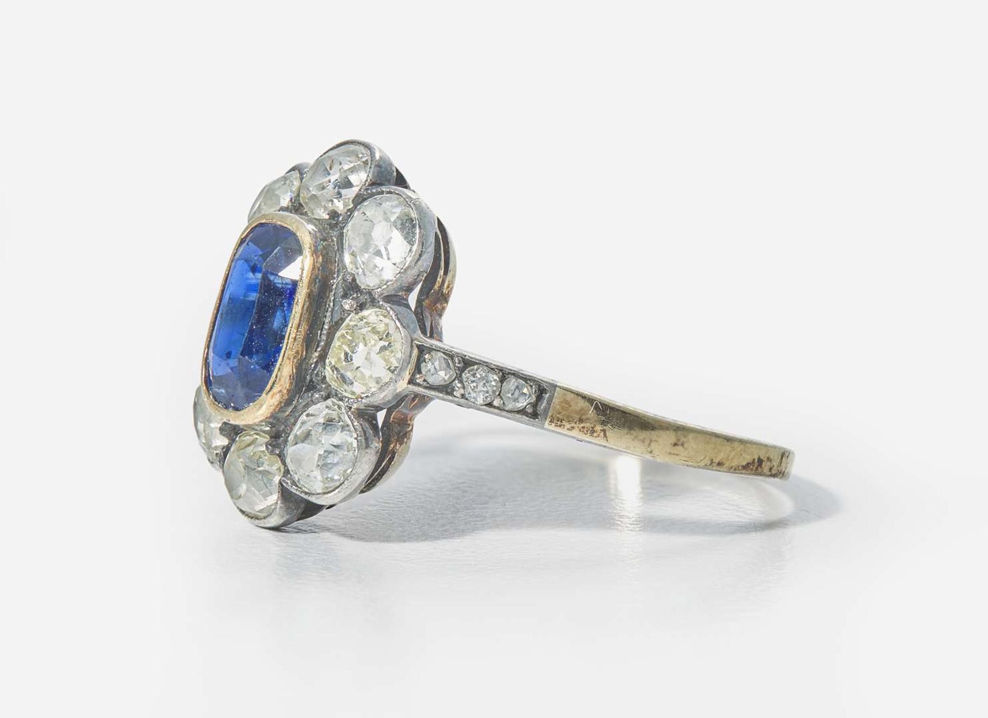 A 14K Yellow Gold, Sapphire, and Diamond Ring