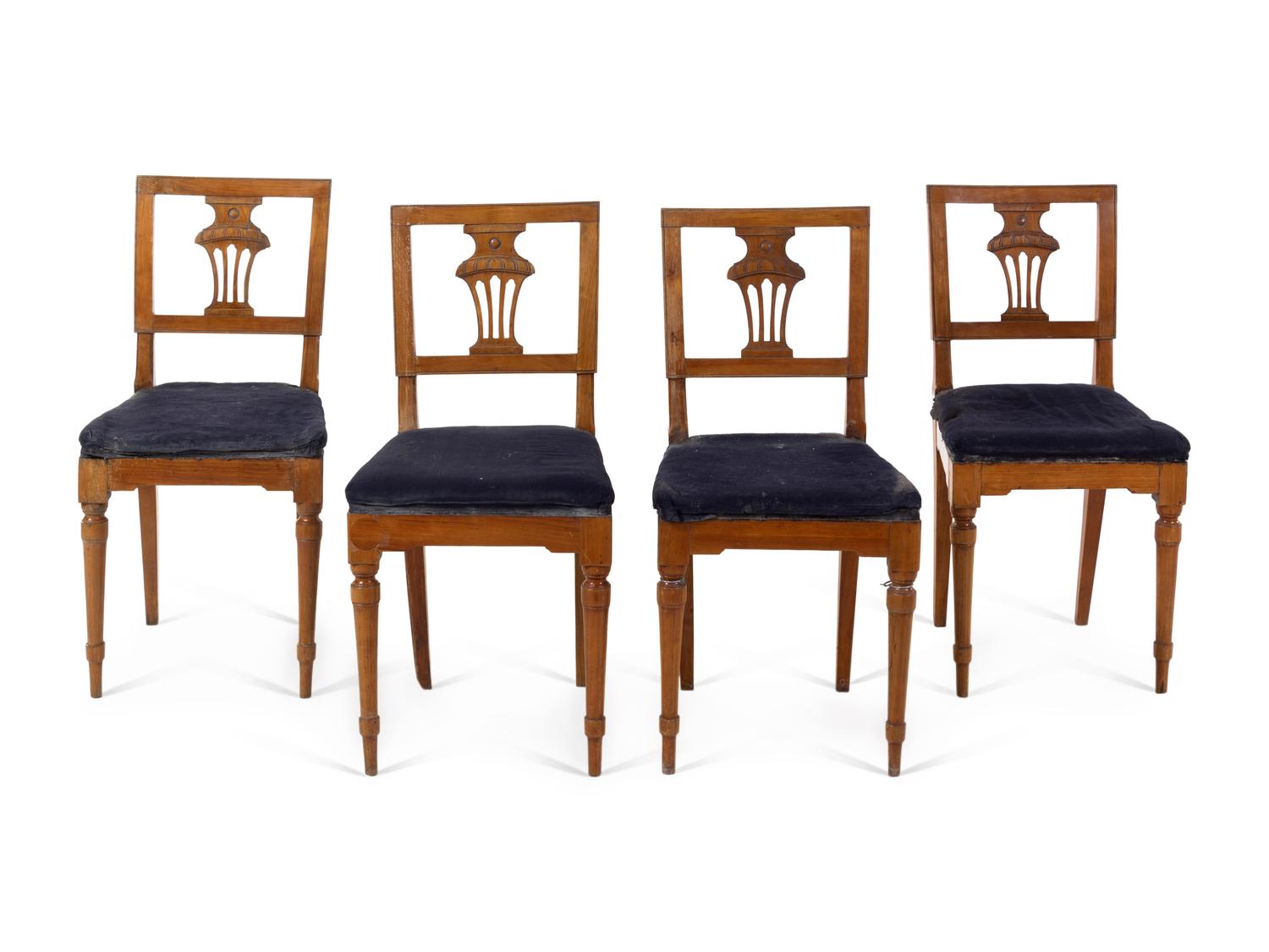 A Set of Four Italian Fruitwood Dining Chairs