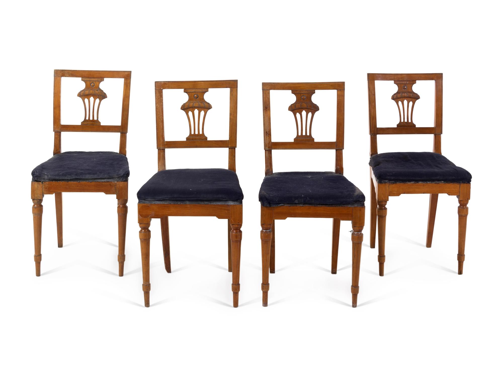 A Set of Four Italian Fruitwood Dining Chairs