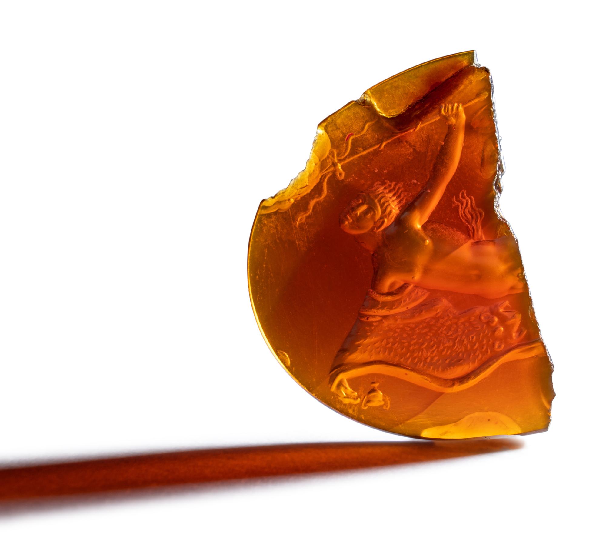 A Roman Carnelian Intaglio Fragment with a Dancing Satyr with the Bacchic Fury