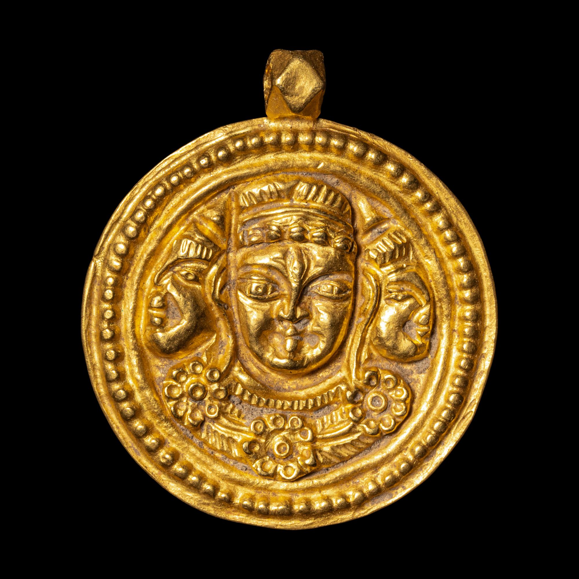 A Eurasian Gold Pendant