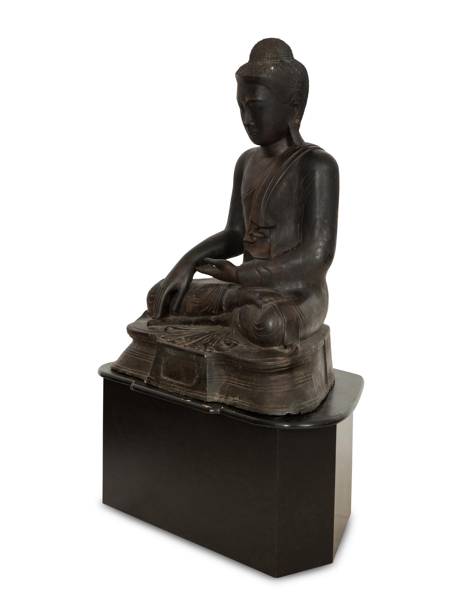 A Large Southeast Asian Bronzed Metal Seated Buddha