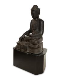 A Large Southeast Asian Bronzed Metal Seated Buddha