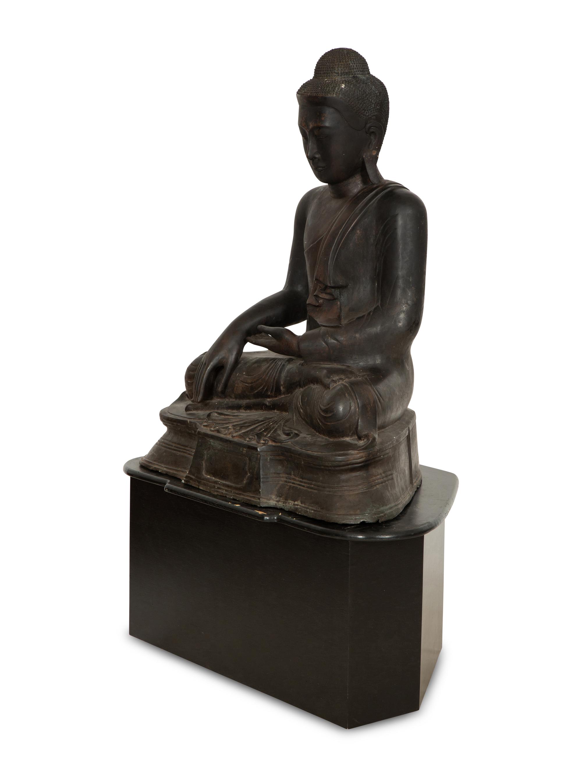 A Large Southeast Asian Bronzed Metal Seated Buddha