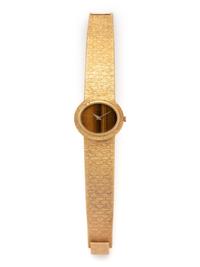 PIAGET, 18K YELLOW GOLD AND TIGER'S EYE WATCH