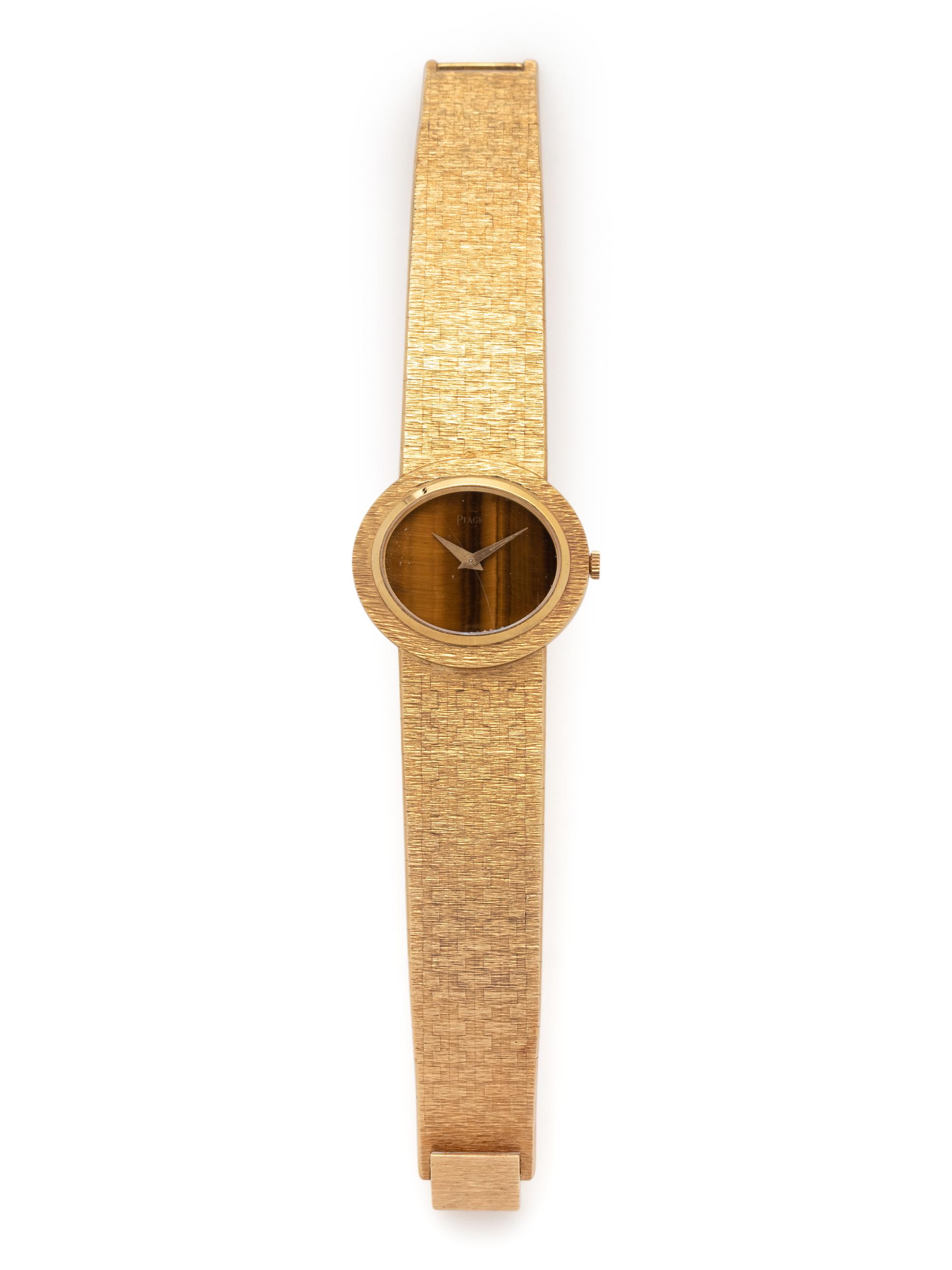 PIAGET, 18K YELLOW GOLD AND TIGER'S EYE WATCH