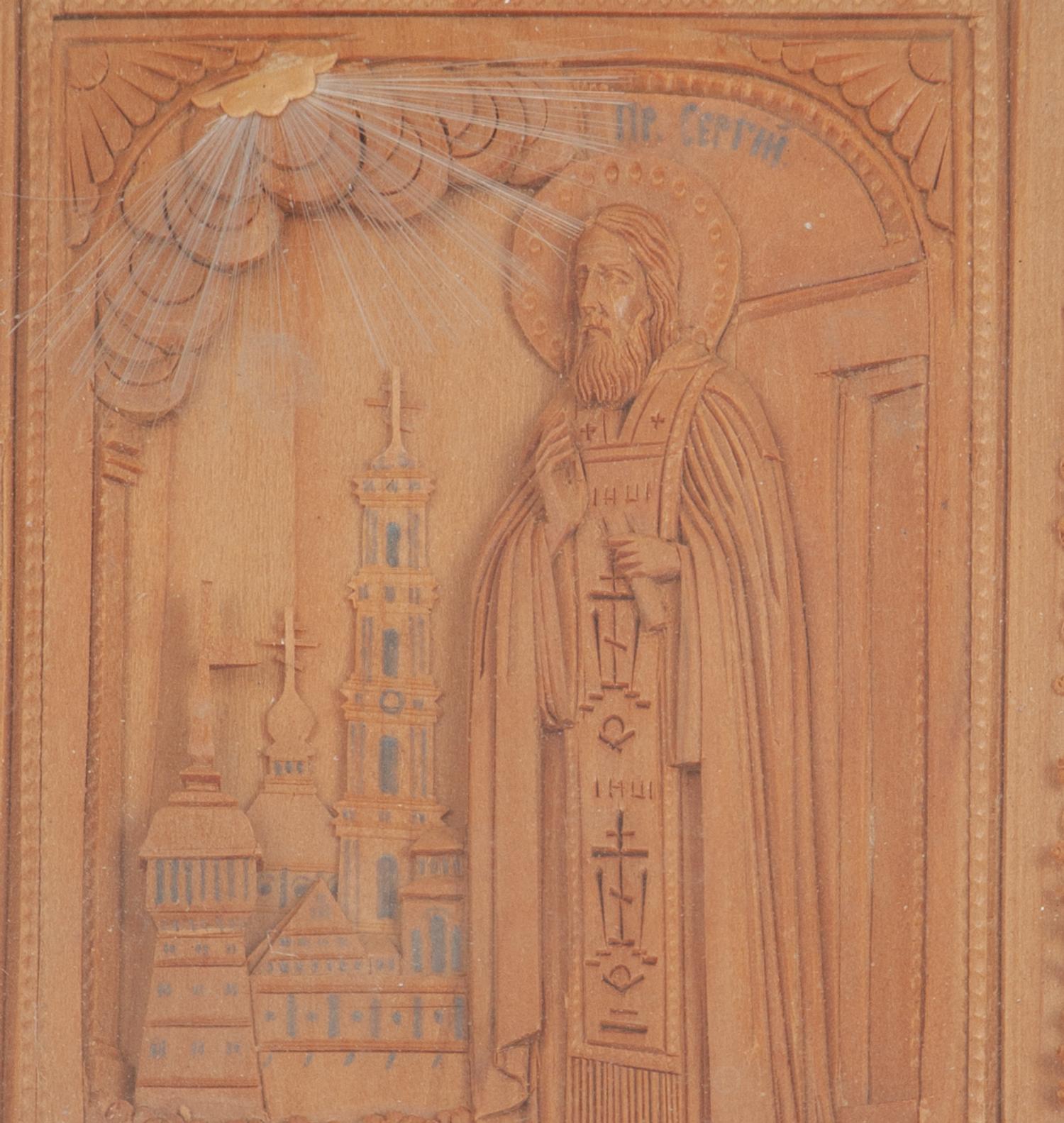 A Carved Wooden Panel depicting a Russian Orthodox Saint