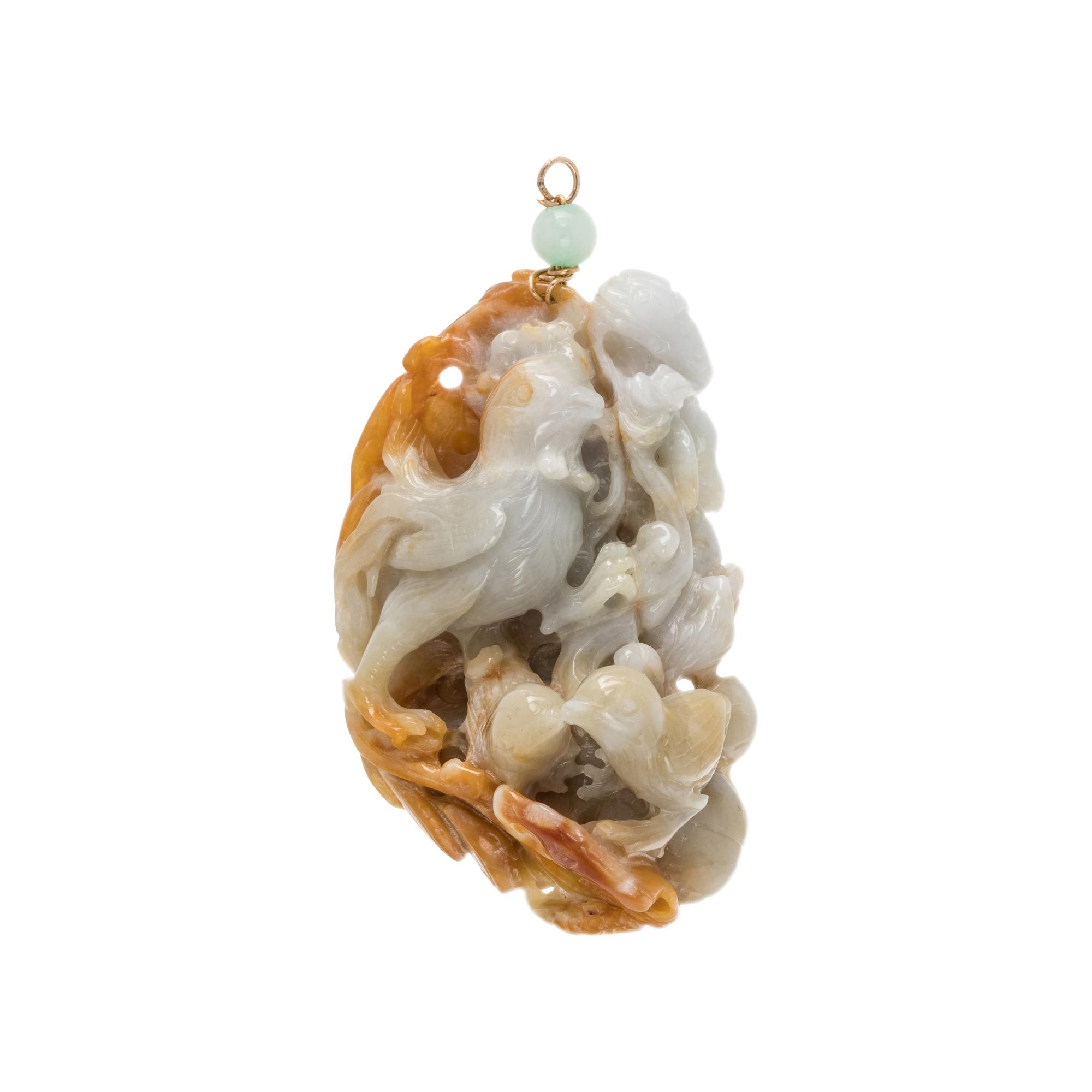 A Carved Jadeite Pendant