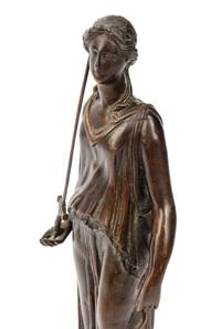 A Continental Patinated Bronze Figure on a Marble Base