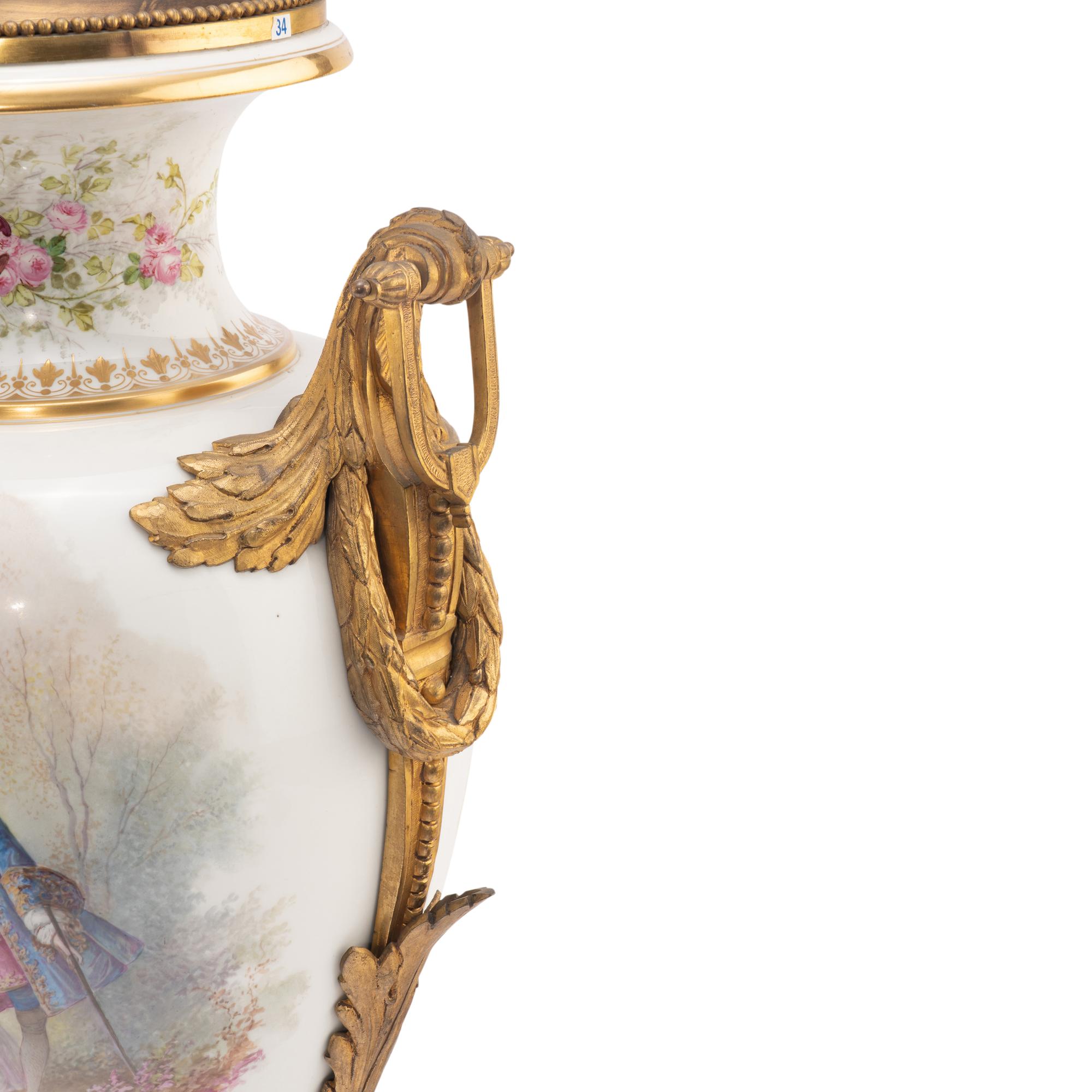 A Sèvres Style Gilt Bronze Mounted Porcelain Urn