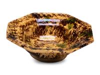 A Large Molded Yellowware Bowl with Flint Enamel Glaze