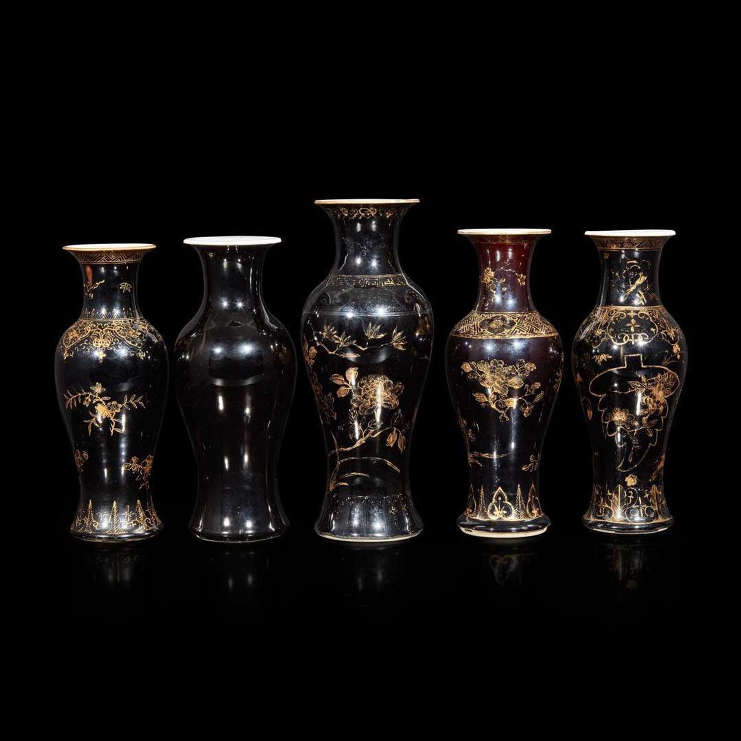 A group of five assorted Chinese "Mirror-black"-glazed porcelain baluster vases Three with apocryphal six-character Kangxi marks