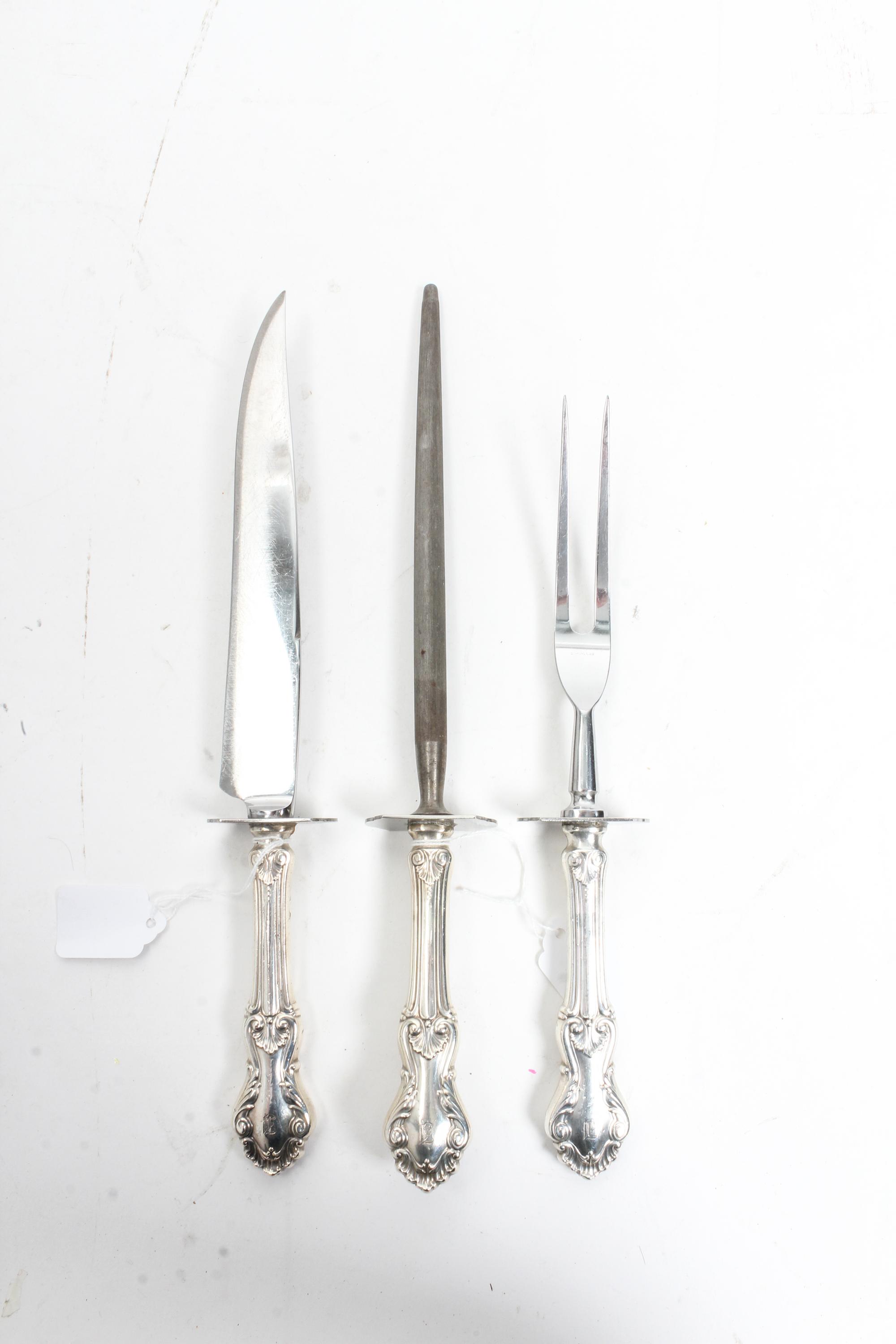 An American Three-Piece Carving Set, Frank M. Whiting & Co., North Attleboro, MA, Georgian Shell pattern, comprising a carving knife, a