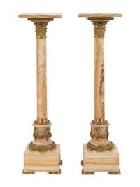 A Pair of French Gilt Bronze Mounted Onyx Pedestals