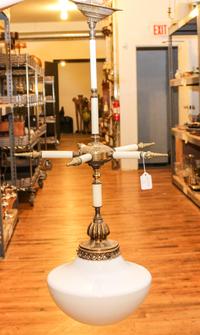An Art Deco Fixture. Length of fixture base 27 inches overall.