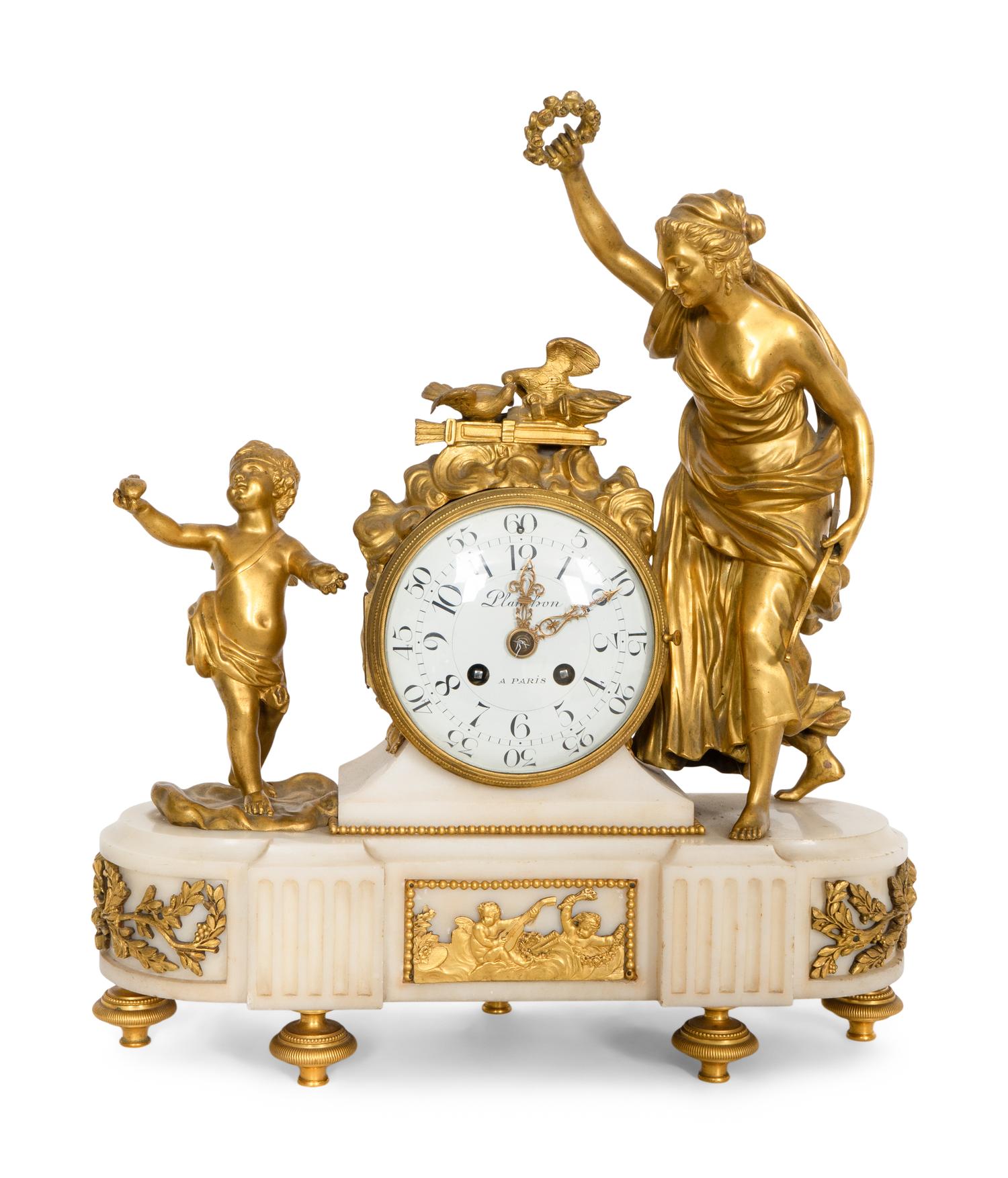 A Napoleon III Marble and Gilt Bronze Mounted Mantel Clock
